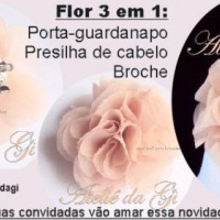 Flor de tecido 3 em 1: porta-guardanapo, broche e presilha.